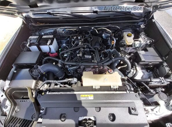 3TMKB5FNXSM031114 2025 TOYOTA TACOMA Silver Вид задньої частини салону