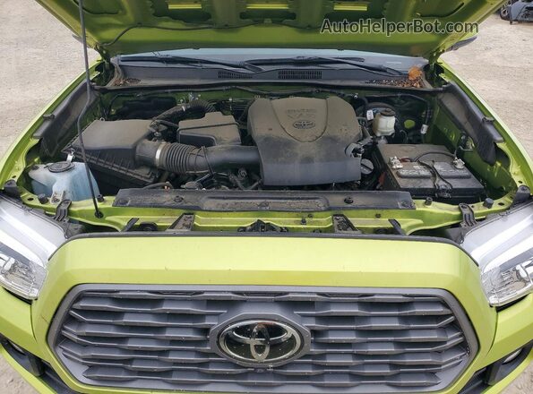 3TYDZ5BN3PT027329 2023 TOYOTA TACOMA Green Սալոնի հետևի տեսք