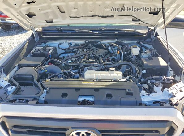 3TYJDAHN2ST021709 2025 TOYOTA TACOMA White Вид задньої частини салону