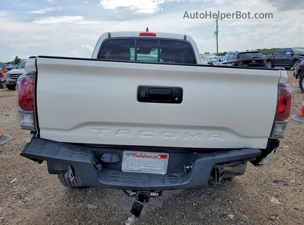 3TYRZ5CN2NT022074 2022 TOYOTA TACOMA White Widok z tyłu