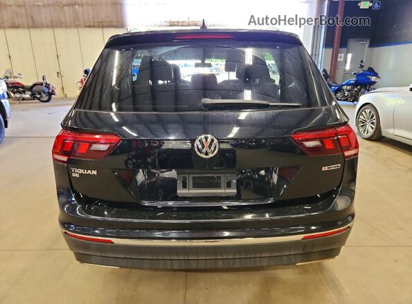 3VV2B7AX1MM095857 2021 VOLKSWAGEN TIGUAN Black Rear view