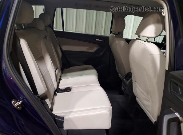 3VV2B7AX5MM027173 2021 VOLKSWAGEN TIGUAN Blue Vista interior trasera