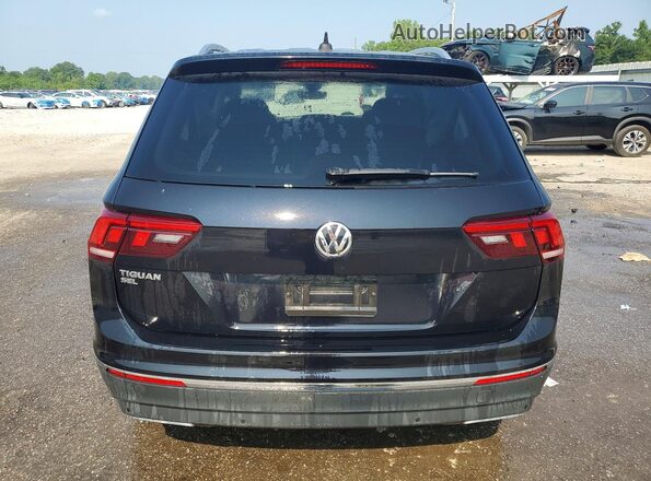 3VV3B7AX1MM075029 2021 VOLKSWAGEN TIGUAN Black Հետևի տեսք