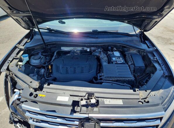 3VV3B7AX4KM064197 2019 VOLKSWAGEN TIGUAN Black Vista interior trasera