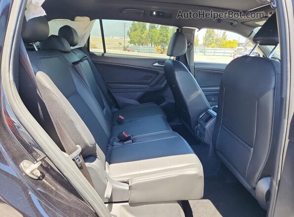 3VV3B7AX4KM064197 2019 VOLKSWAGEN TIGUAN Black Vista de los asientos traseros