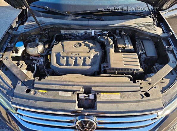 3VV3B7AX9NM153154 2022 VOLKSWAGEN TIGUAN Black Սալոնի հետևի տեսք
