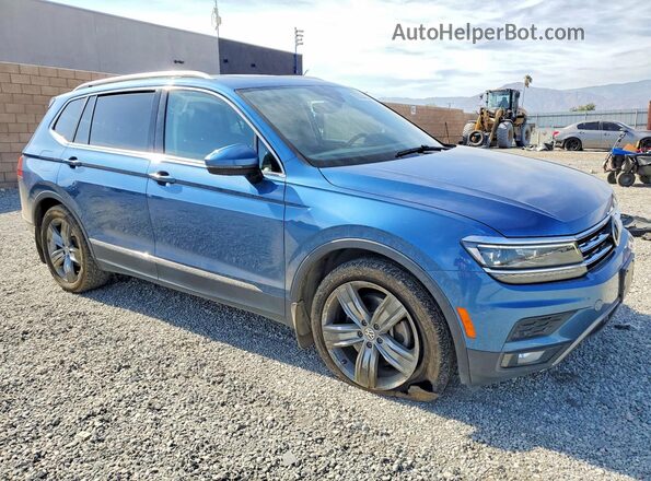 3VV4B7AX1JM208615 2018 VOLKSWAGEN TIGUAN Blue Delantero derecho