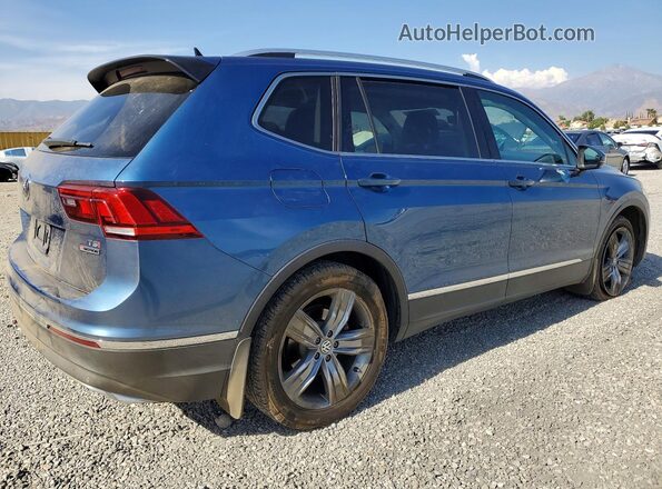 3VV4B7AX1JM208615 2018 VOLKSWAGEN TIGUAN Blue Trasero derecho