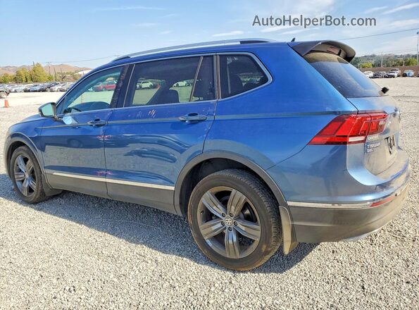 3VV4B7AX1JM208615 2018 VOLKSWAGEN TIGUAN Blue Trasero izquierdo