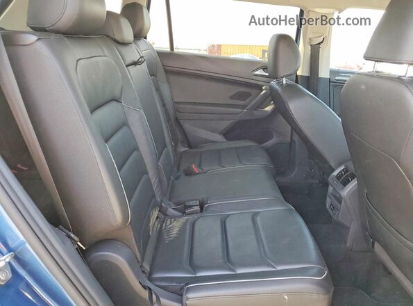 3VV4B7AX1JM208615 2018 VOLKSWAGEN TIGUAN Blue Vista interior trasera