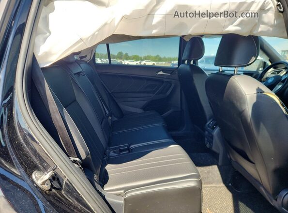 3VV8B7AX1RM111721 2024 VOLKSWAGEN TIGUAN Black Սալոնի հետևի տեսք