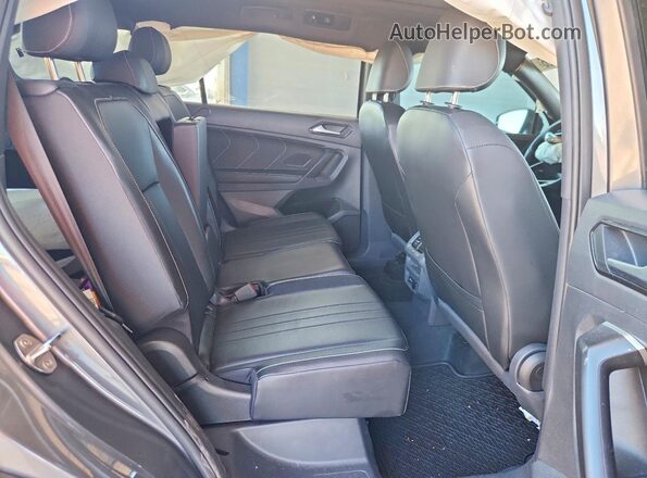 3VVCB7AX8RM099402 2024 VOLKSWAGEN TIGUAN Gray Vista interior trasera