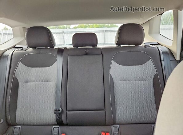 3VVCX7B24PM370991 2023 VOLKSWAGEN TAOS White Rear seats view
