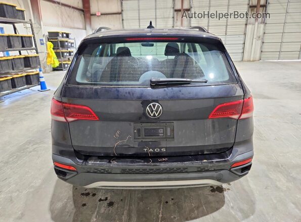 3VVCX7B28PM362974 2023 VOLKSWAGEN TAOS Black Rear view