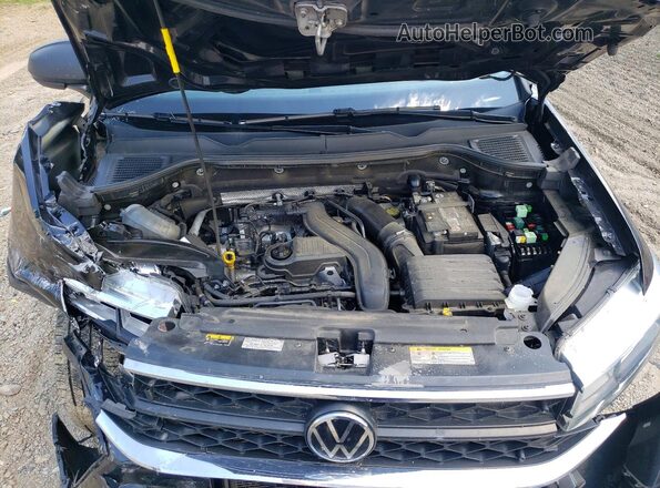 3VVCX7B29PM374129 2023 VOLKSWAGEN TAOS Black Engine compartment view
