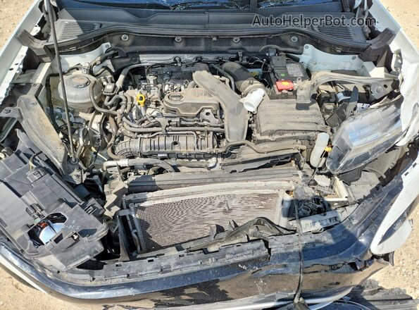 3VVDX7B27NM034396 2022 VOLKSWAGEN TAOS White Vista del compartimento del motor