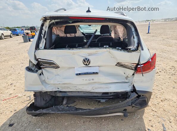3VVDX7B27NM034396 2022 VOLKSWAGEN TAOS White Vista trasera