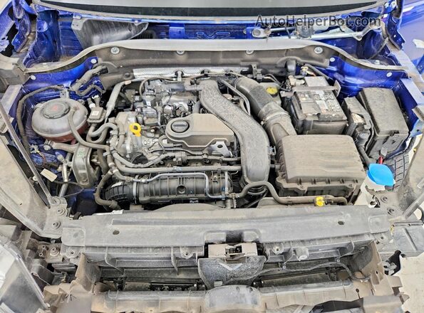 3VVEX7B22RM028967 2024 VOLKSWAGEN TAOS Blue Vista del compartimento del motor