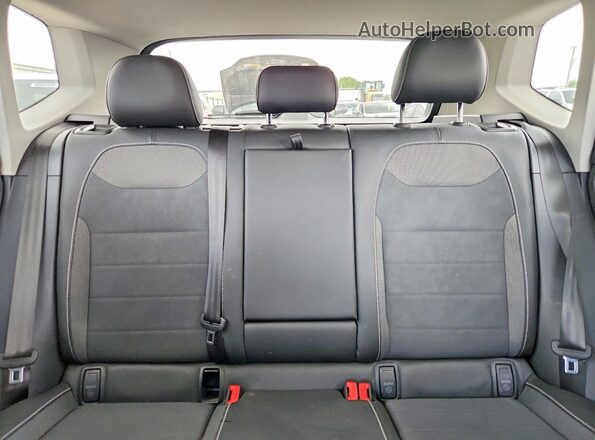 3VVEX7B22RM028967 2024 VOLKSWAGEN TAOS Blue Vista de los asientos traseros