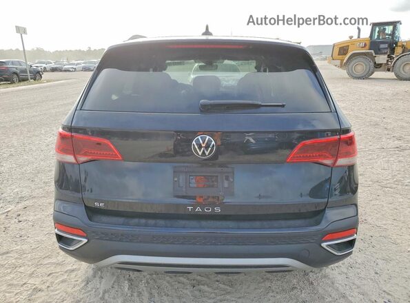 3VVEX7B26PM369348 2023 VOLKSWAGEN TAOS Black Вид ззаду