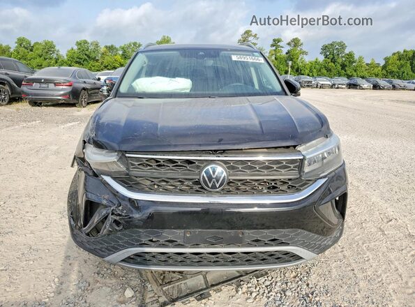 3VVEX7B26PM369348 2023 VOLKSWAGEN TAOS Black Вид спереду
