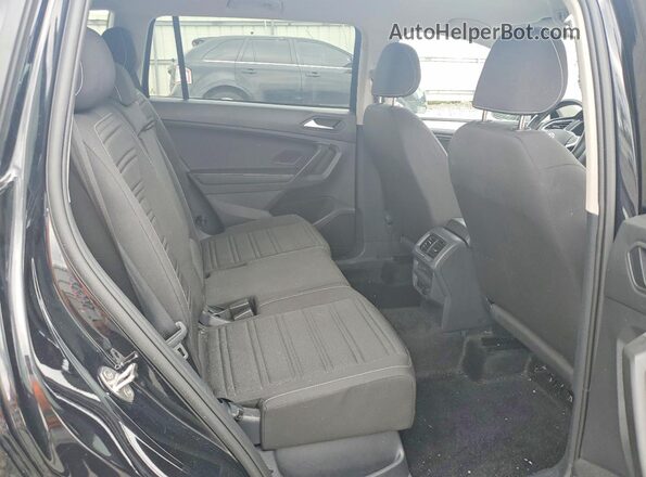 3VVFB7AX7RM130152 2024 VOLKSWAGEN TIGUAN Black Vista interior trasera