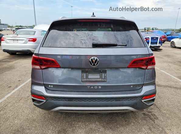 3VVLX7B26NM045899 2022 VOLKSWAGEN TAOS Gray Rear view