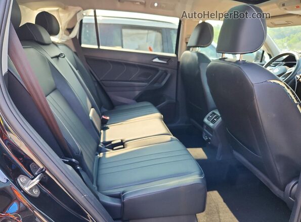 3VVMB7AX4RM114711 2024 VOLKSWAGEN TIGUAN Черный Вид задней части салона