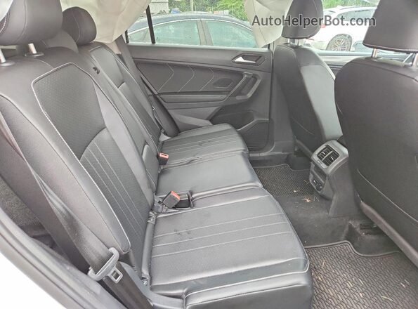 3VVMB7AX8RM043772 2024 VOLKSWAGEN TIGUAN White Widok wnętrza z tyłu