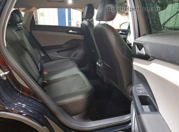 3VVNX7B2XPM327281 2023 VOLKSWAGEN TAOS Black Vista interior trasera