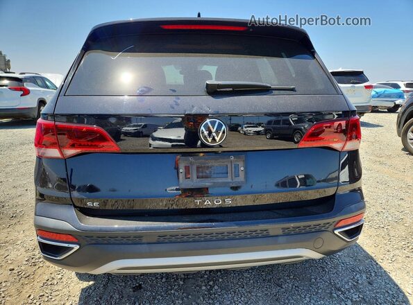 3VVSX7B20RM066121 2024 VOLKSWAGEN TAOS Black Rear view