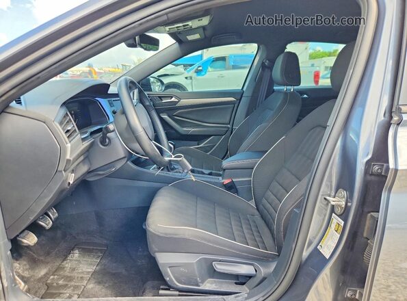 3VWAM7BU9PM034217 2023 VOLKSWAGEN JETTA Серый Вид салона спереди
