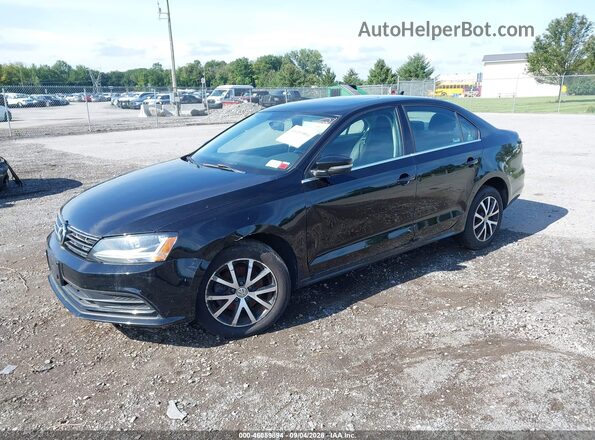 3VWDB7AJ4JM263891 2018 VOLKSWAGEN JETTA Черный Передняя левая четверть