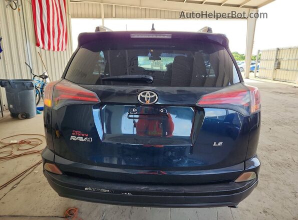 JTMZFREV7HJ127283 2017 TOYOTA RAV4 Blue Front interior view