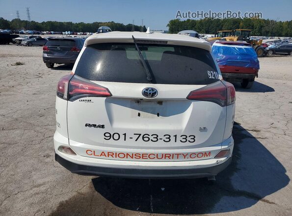 JTMZFREVXGJ099218 2016 TOYOTA RAV4 White წინა სალონის ხედი