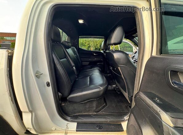 5TFCZ5AN5KX175588 2019 TOYOTA TACOMA Белый Вид задней части салона