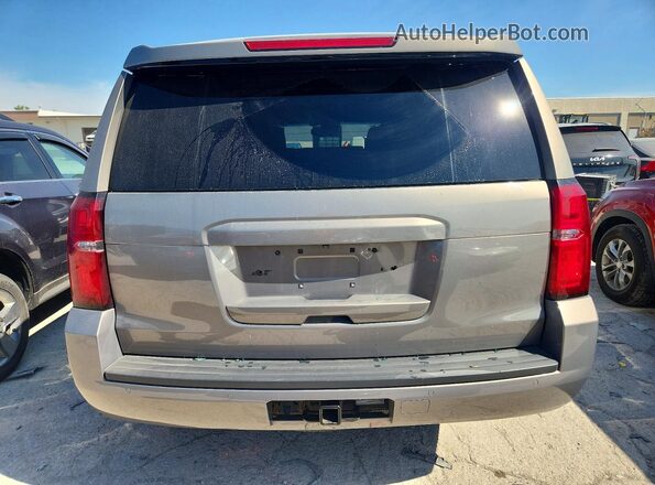 1GNSKDEC1JR221480 2018 CHEVROLET TAHOE Gray Вид салону спереду