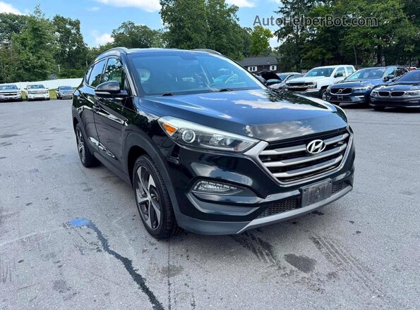 KM8J3CA25GU149712 2016 HYUNDAI TUCSON Black Widok z przodu