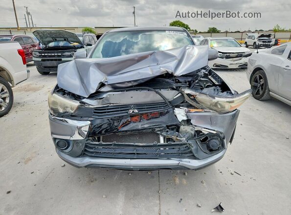JA4AP3AU6HZ008561 2017 MITSUBISHI OUTLANDER Silver Rear view