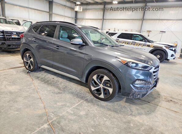 KM8J3CA20JU633259 2018 HYUNDAI TUCSON Gray Vista frontal