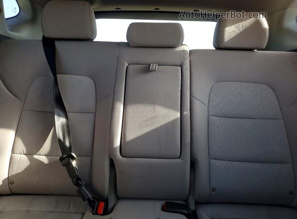 KM8J33A23GU101822 2016 HYUNDAI TUCSON Gray Widok wnętrza z tyłu