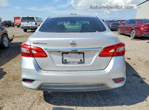 3N1AB7AP2JY225453 2018 NISSAN SENTRA Silver Front interior view