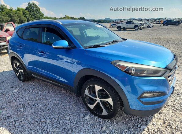 KM8J3CA22GU184515 2016 HYUNDAI TUCSON Blue Front view