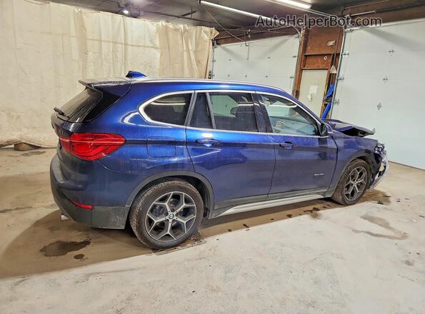 WBXHT3C32GP883105 2016 BMW X1 Blue Передня права чверть