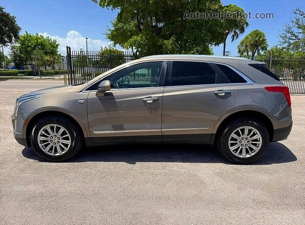 1GYKNARS2HZ240947 2017 CADILLAC XT5 Gold VIN კოდის სტიკერის ხედი