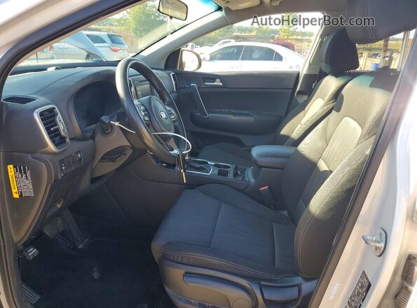 KNDPM3AC8K7586115 2019 KIA SPORTAGE Серебряный Вид панели приборов
