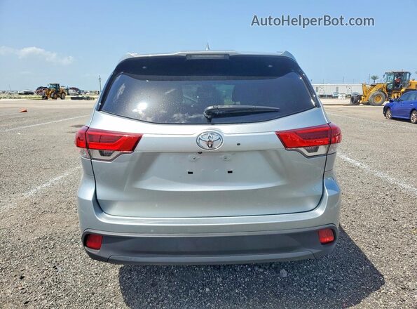 5TDKZRFH6KS352564 2019 TOYOTA HIGHLANDER Silver Widok wnętrza z przodu