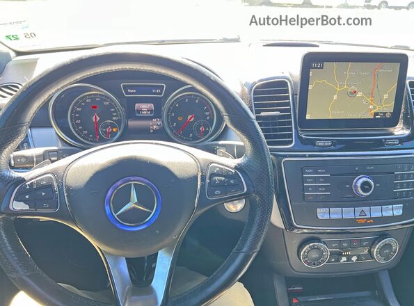 4JGDA5JB9JB018588 2018 MERCEDES-BENZ GLE Blue Vista interior delantera