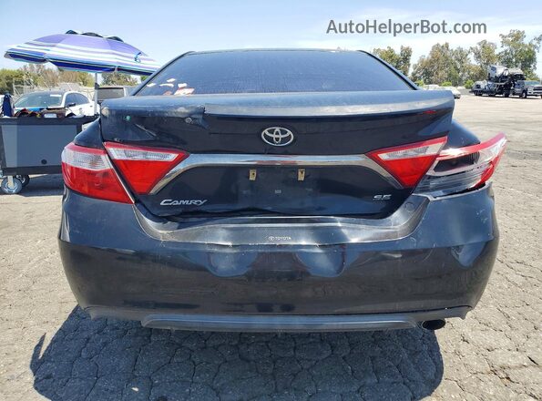 4T1BF1FK4HU651900 2017 TOYOTA CAMRY Black Rear view