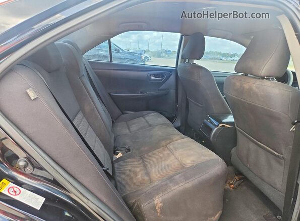 4T1BF1FK7HU760898 2017 TOYOTA CAMRY Black Rear seats view